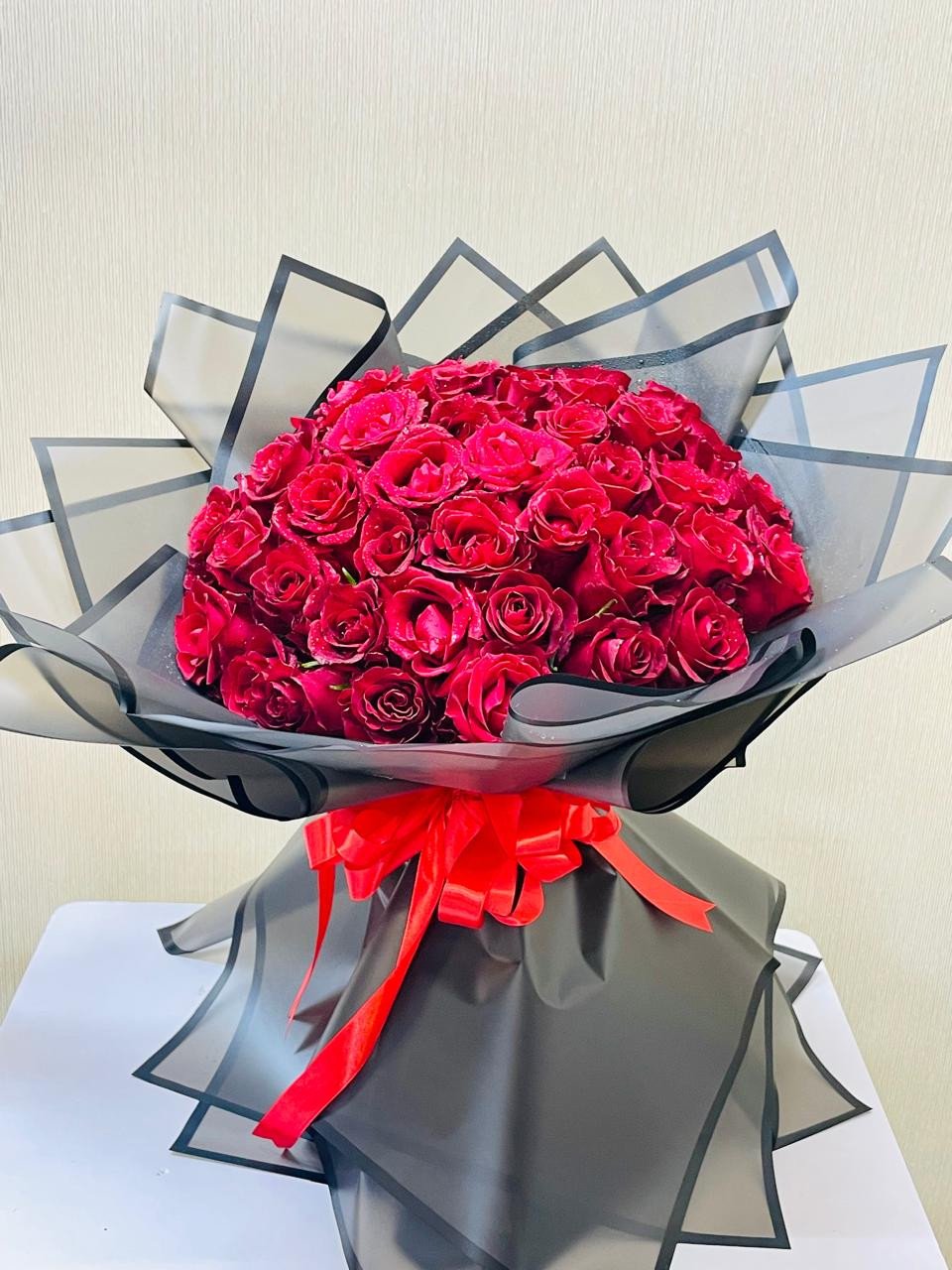 Crimson Desire Bouquet - Red Roses Wrapped in Black Elegance